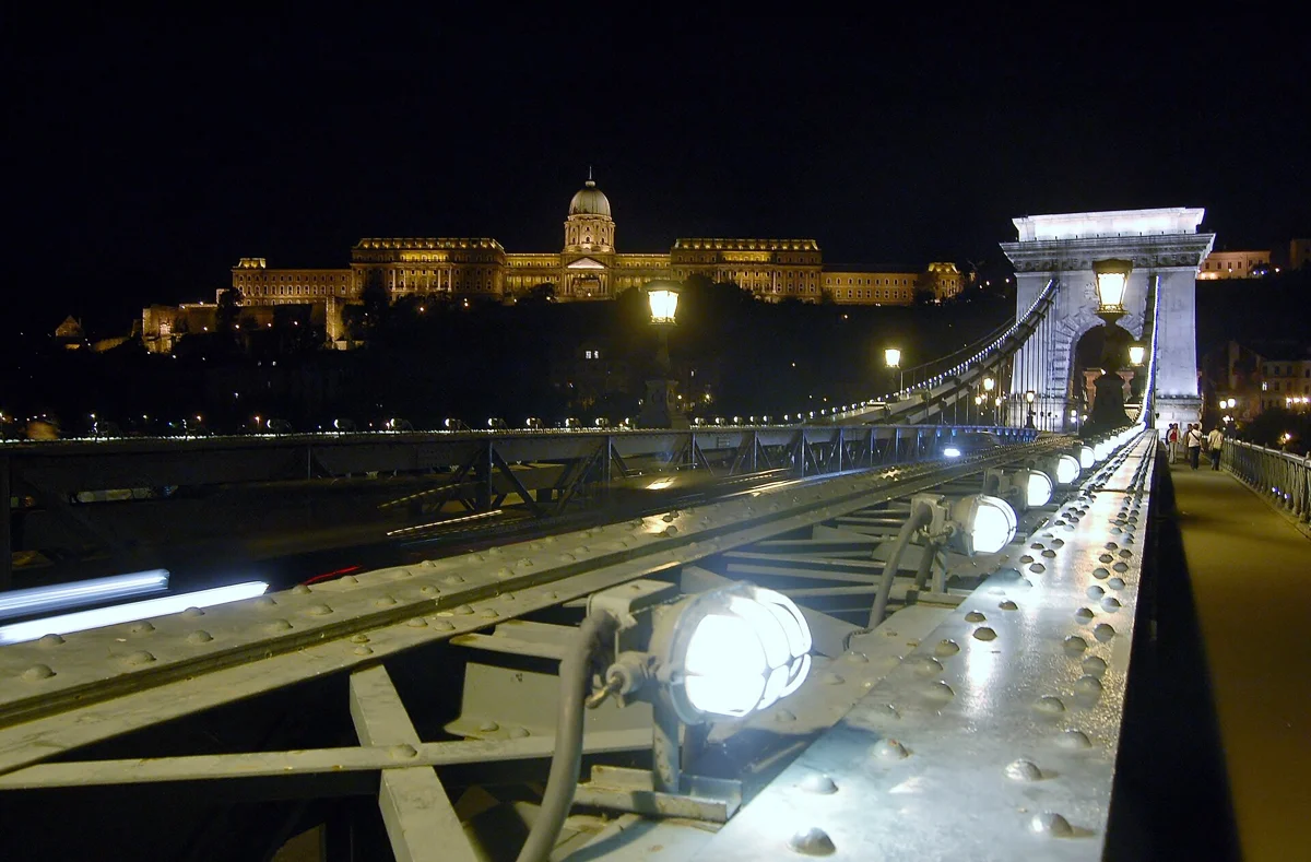 Buda Castle and the Chain Bridge lit at night, the Danube view on a Budapest Christmas walking tour with Basilica entry